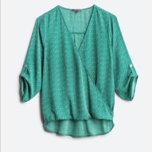 Green and white high low blouse